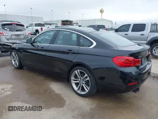 2019 BMW 4 Series 430i xDrive with VIN WBA4J3C50KBL09320, listed as a IAAI auction lot 41677736 with 73,277 mi miles. Bid and sale history available at carsss.com. Image 3.
