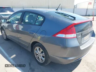 2010 Honda Insight EX with VIN JHMZE2H72AS015870, listed as a IAAI auction lot 42762384 with 58,121 mi miles and . Bid and sale history available at DreamBid. Image 3.