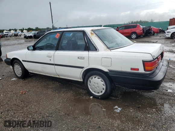 1991 Toyota Camry z VIN JT2SV21E2M3435406, wystawiony jako Copart lot #74958494 z przebiegiem 127 580 mil mil oraz Szkoda całkowita • Salvage title. Historia ofert i sprzedaży dostępna na DreamBid. Obrazek 2.