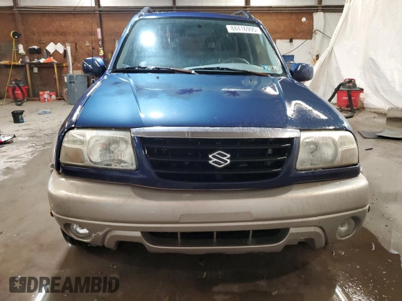 2002 Suzuki Grand Vitara JLX z VIN JS3TD62V524160739, wystawiony jako Copart lot #88416995 z przebiegiem 98 820 mil mil oraz Szkoda całkowita • Salvage title. Historia ofert i sprzedaży dostępna na DreamBid. Obrazek 5.