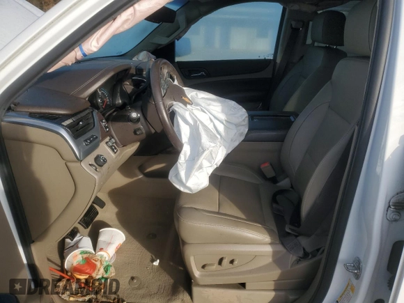 2019 Chevrolet Suburban LT with VIN 1GNSCJKC8KR354299, listed as a Copart auction lot 84266174 with 77,780 mi miles and Salvage Title. Bid and sale history available at carsss.com. Image 7.
