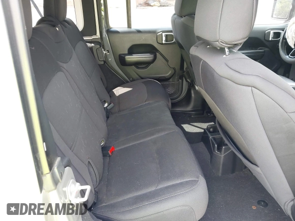 2020 Jeep Wrangler Unlimited Freedom with VIN 1C4HJXDG2LW186027, listed as a IAAI auction lot 42449664 with 87,869 mi miles and . Bid and sale history available at DreamBid. Image 8.
