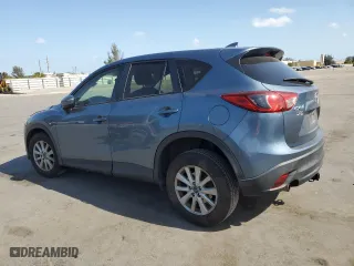 2016 Mazda CX-5 Touring with VIN JM3KE2CY1G0841608, listed as a Copart auction lot 52181265 with 70,600 mi miles and Salvage Title. Bid and sale history available at carsss.com. Image 2.
