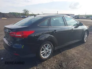 2016 Ford Focus SE with VIN 1FADP3F26GL204663, listed as a IAAI auction lot 42664653 with 138,141 mi miles and . Bid and sale history available at DreamBid. Image 4.