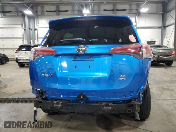 2017 Toyota RAV4 LE with VIN JTMBFREV8HJ141257, listed as a Copart auction lot 54527785 with 125,423 mi miles and Salvage Title. Bid and sale history available at DreamBid. Image 6.