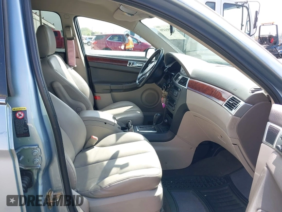 2005 Chrysler Pacifica Touring with VIN 2C8GF68475R434354, listed as a IAAI auction lot 42004496 with 212,092 mi miles and . Bid and sale history available at DreamBid. Image 5.