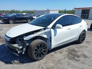 2022 Tesla Model Y Long Range with VIN 7SAYGAEE8NF431786, listed as a IAAI auction lot 41750353 with 67,846 mi miles and . Bid and sale history available at carsss.com. Image 2.