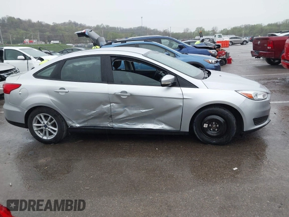2017 Ford Focus SE with VIN 1FADP3F24HL303600, listed as a IAAI auction lot 41948159 with 95,212 mi miles and . Bid and sale history available at DreamBid. Image 14.