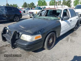 2008 Ford Police Interceptor z VIN 2FAFP71V18X150470, wystawiony jako IAAI lot #42301553 z przebiegiem 82 116 mil mil oraz . Historia ofert i sprzedaży dostępna na DreamBid. Obrazek 2.
