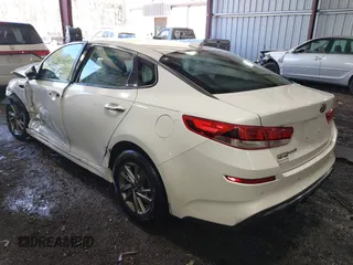 2019 Kia Optima LX with VIN 5XXGT4L33KG363512, listed as a IAAI auction lot 41824631 with 105,034 mi miles. Bid and sale history available at carsss.com. Image 3.