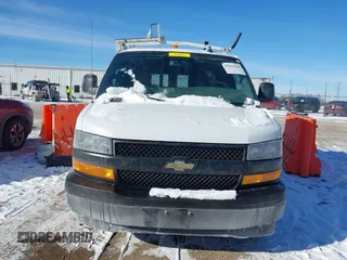 2019 Chevrolet Express Cargo Van with VIN 1GCWGAFP2K1165836, listed as a IAAI auction lot 41413698 with 139,469 mi miles. Bid and sale history available at carsss.com. Image 12.