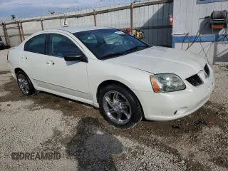 2004 Mitsubishi Galant ES z VIN 4A3AB36FX4E101970, wystawiony jako Copart lot #80471514 z przebiegiem 244 237 mil mil oraz Szkoda całkowita • Salvage title. Historia ofert i sprzedaży dostępna na DreamBid. Obrazek 4.