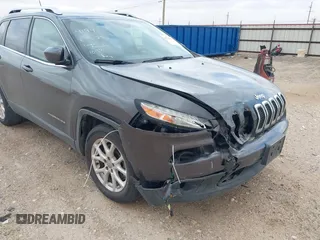 2014 Jeep Cherokee Latitude z VIN 1C4PJLCS1EW319194, wystawiony jako IAAI lot #41710491 z przebiegiem 108 136 mil mil oraz . Historia ofert i sprzedaży dostępna na DreamBid. Obrazek 6.