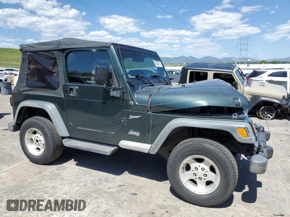 2002 Jeep Wrangler Sport с VIN 1J4FA49SX2P738105, выставлен на аукционе Copart как лот 60320775 с пробегом 402 518 миль миль и Списание • Salvage title. История ставок и продаж доступна на DreamBid. Изображение 4.