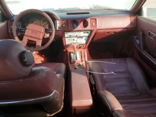 1985 Nissan 300ZX z VIN JN1HZ16S9FX050874, wystawiony jako Copart lot #72283704 z przebiegiem 139 895 mil mil oraz Tytuł czysty. Historia ofert i sprzedaży dostępna na DreamBid. Obrazek 8.