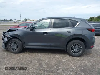 2021 Mazda CX-5 Touring with VIN JM3KFACM1M0461510, listed as a IAAI auction lot 41660439 with 30,352 mi miles. Bid and sale history available at carsss.com. Image 14.