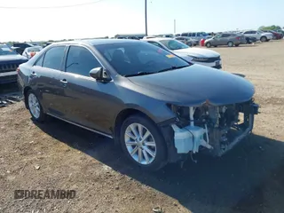 2014 Toyota Camry L with VIN 4T1BF1FK4EU733637, listed as a IAAI auction lot 41979947 with 120,060 mi miles. Bid and sale history available at carsss.com. Image 1.
