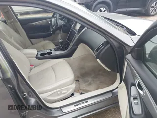 2015 Infiniti Q50 Premium z VIN JN1BV7AR9FM413801, wystawiony jako IAAI lot #42134770 z przebiegiem 111 367 mil mil oraz . Historia ofert i sprzedaży dostępna na DreamBid. Obrazek 5.