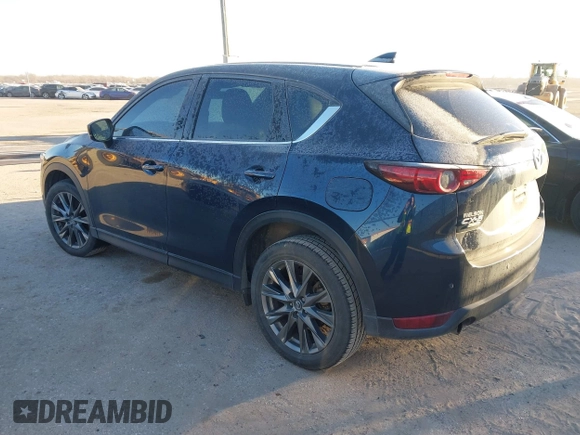 2019 Mazda CX-5 Signature with VIN JM3KFBEY5K0656965, listed as a IAAI auction lot 41421453 with 99,073 mi miles. Bid and sale history available at carsss.com. Image 3.