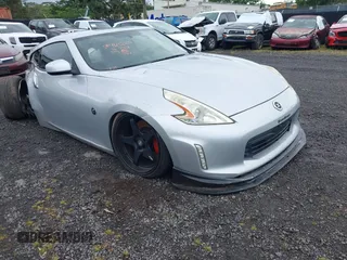 2016 Nissan 370Z with VIN JN1AZ4EH4GM931574, listed as a IAAI auction lot 41252654 with 52,332 mi miles. Bid and sale history available at carsss.com. Image 1.