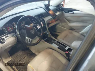 2012 Volkswagen Passat SE with VIN 1VWBH7A38CC053564, listed as a IAAI auction lot 41488237 with 188,636 mi miles and . Bid and sale history available at DreamBid. Image 5.