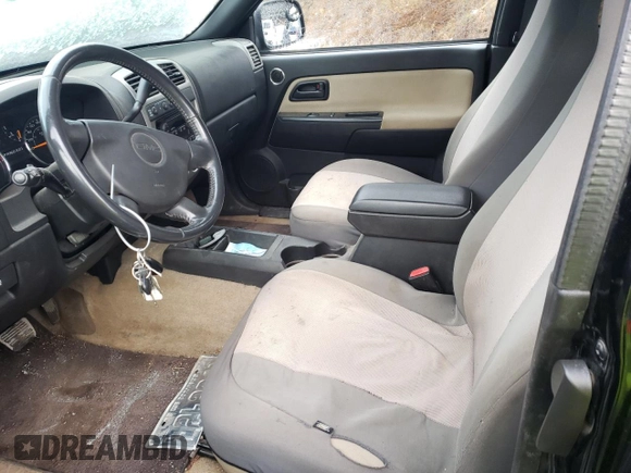 2007 GMC Canyon Work Truck with VIN 1GTDT19E978199462, listed as a Copart auction lot 80053134 with 101,597 mi miles and Salvage Title. Bid and sale history available at carsss.com. Image 7.