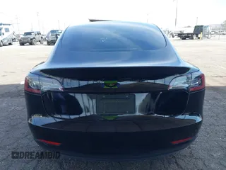 2019 Tesla Model 3 Mid Range with VIN 5YJ3E1EA1KF410297, listed as a IAAI auction lot 41841991 with 176,254 mi miles. Bid and sale history available at carsss.com. Image 16.