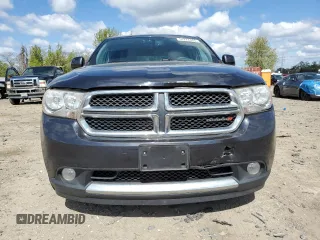 2013 Dodge Durango SXT with VIN 1C4RDJAG0DC693413, listed as a Copart auction lot 51777405 with 160,231 mi miles and Salvage Title. Bid and sale history available at carsss.com. Image 5.