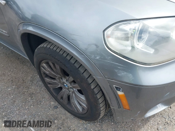 2013 BMW X5 xDrive50i with VIN 5UXZV8C52D0C15272, listed as a IAAI auction lot 42644739 with 169,393 mi miles and . Bid and sale history available at DreamBid. Image 6.