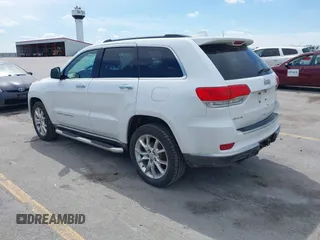 2014 Jeep Grand Cherokee Summit with VIN 1C4RJFJG0EC174871, listed as a IAAI auction lot 42341312 with 170,743 mi miles and . Bid and sale history available at DreamBid. Image 3.