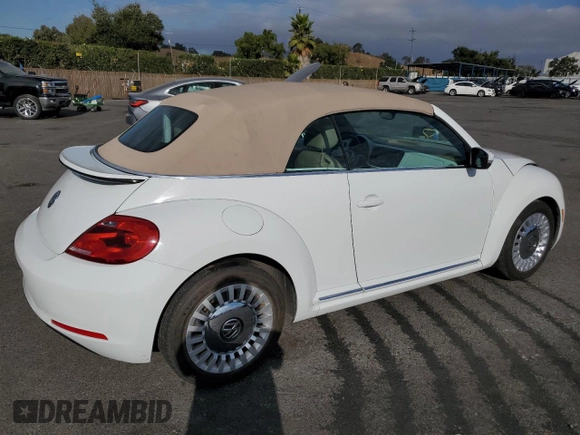 2015 Volkswagen Beetle 1.8T with VIN 3VW517AT6FM802771, listed as a Copart auction lot 72225834 with 128,946 mi miles and Salvage title. Bid and sale history available at DreamBid. Image 3.