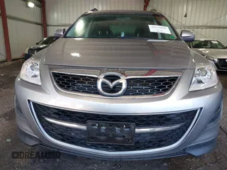 2011 Mazda CX-9 Touring with VIN JM3TB3CV6B0307358, listed as a IAAI auction lot 41979197 with 128,471 mi miles. Bid and sale history available at carsss.com. Image 6.