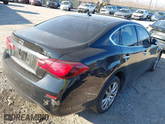 2015 Infiniti Q70 with VIN JN1BY1AR6FM560209, listed as a IAAI auction lot 41703926 with 117,503 mi miles and . Bid and sale history available at DreamBid. Image 4.