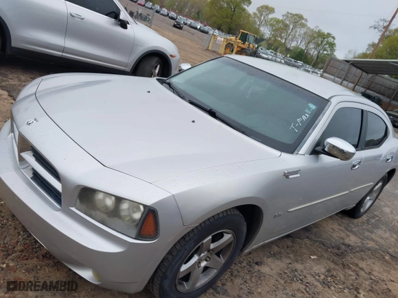 2009 Dodge Charger SXT with VIN 2B3KA33V69H546018, listed as a IAAI auction lot 41957347 with 109,648 mi miles. Bid and sale history available at carsss.com. Image 2.