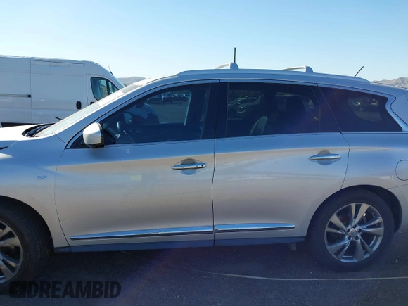 2015 Infiniti QX60 with VIN 5N1AL0MN7FC553099, listed as a IAAI auction lot 42094321 with 100,023 mi miles and . Bid and sale history available at DreamBid. Image 14.