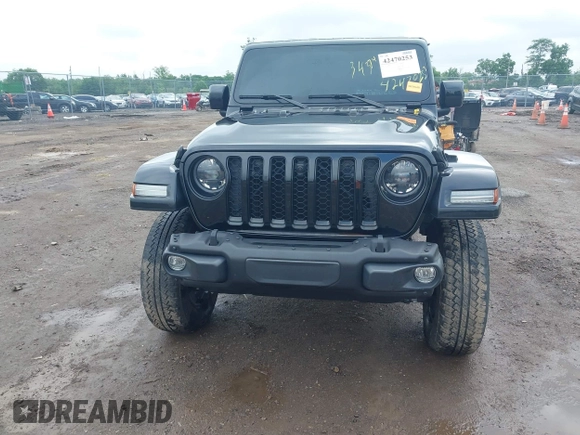 2023 Jeep Gladiator Overland with VIN 1C6JJTFM9PL593659, listed as a IAAI auction lot 42470253 with 34,374 mi miles and . Bid and sale history available at DreamBid. Image 20.