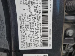 2023 Honda Civic Sport z VIN 2HGFE2F50PH556908, wystawiony jako Copart lot #52789655 z przebiegiem Nie podano mil oraz Szkoda całkowita • Salvage title. Historia ofert i sprzedaży dostępna na DreamBid. Obrazek 14.