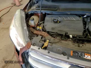 2017 Ford Escape SE z VIN 1FMCU9GD7HUA37707, wystawiony jako Copart lot #59005545 z przebiegiem 106 554 mil mil oraz Szkoda całkowita • Salvage title. Historia ofert i sprzedaży dostępna na DreamBid. Obrazek 16.