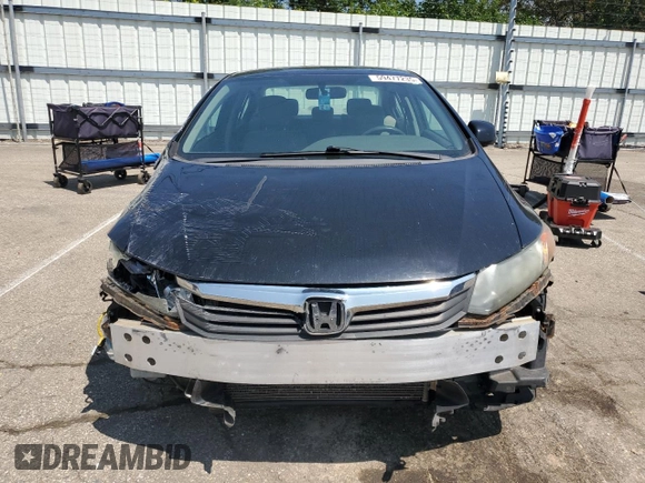 2012 Honda Civic LX z VIN 19XFB2F50CE051626, wystawiony jako Copart lot #59477235 z przebiegiem 126 225 mil mil oraz Szkoda całkowita • Salvage title. Historia ofert i sprzedaży dostępna na DreamBid. Obrazek 5.