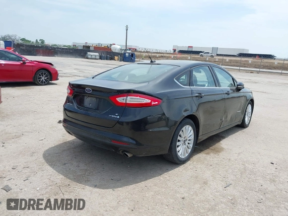 2013 Ford Fusion SE Hybrid with VIN 3FA6P0LU8DR272179, listed as a IAAI auction lot 42058668 with 177,023 mi miles and . Bid and sale history available at DreamBid. Image 4.