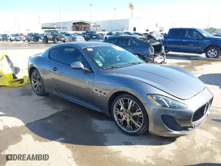 2013 Maserati GranTurismo Sport with VIN ZAM45VLA7D0074506, listed as a IAAI auction lot 41455462 with 34,292 mi miles. Bid and sale history available at carsss.com. Image 1.