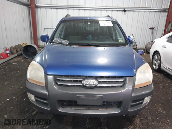2005 Kia Sportage LX with VIN KNDJE723757109849, listed as a IAAI auction lot 41505516 with 243,556 mi miles and . Bid and sale history available at carsss.com. Image 6.