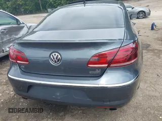 2013 Volkswagen CC Executive z VIN WVWGU7AN8DE520610, wystawiony jako IAAI lot #42278719 z przebiegiem 197 905 mil mil oraz . Historia ofert i sprzedaży dostępna na DreamBid. Obrazek 16.