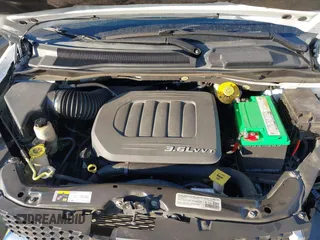 2014 Dodge Grand Caravan SE with VIN 2C4RDGBG1ER220534, listed as a IAAI auction lot 41262990 with 77,851 mi miles and . Bid and sale history available at DreamBid. Image 10.