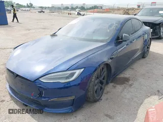 2021 Tesla Model S Plaid with VIN 5YJSA1E64MF442036, listed as a IAAI auction lot 42141304 with 24,998 mi miles and . Bid and sale history available at DreamBid. Image 18.