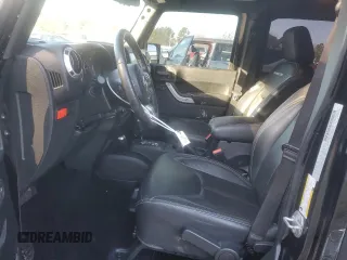 2016 Jeep Wrangler Unlimited Rubicon with VIN 1C4HJWFG9GL220687, listed as a Copart auction lot 48545685 with 49,474 mi miles and Salvage Title. Bid and sale history available at carsss.com. Image 7.
