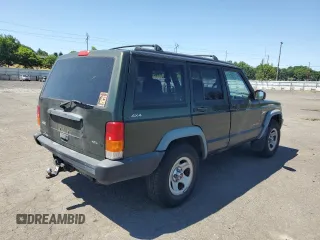 1998 Jeep Cherokee Sport with VIN 1J4FJ68S5WL108020, listed as a Copart auction lot 60150655 with 290,595 mi miles and Salvage title. Bid and sale history available at DreamBid. Image 3.