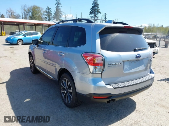 2018 Subaru Forester Touring with VIN JF2SJGWC0JH523099, listed as a IAAI auction lot 42034873 with 25,763 mi miles. Bid and sale history available at carsss.com. Image 3.