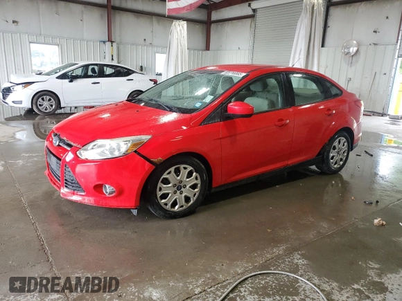 2012 Ford Focus SE with VIN 1FAHP3F23CL335416, listed as a Copart auction lot 60038865 with 147,980 mi miles and Salvage title. Bid and sale history available at DreamBid. Image 1.