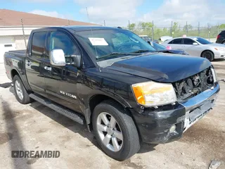 2011 Nissan Titan SL z VIN 1N6AA0EC2BN312778, wystawiony jako IAAI lot #42369067 z przebiegiem 195 297 mil mil oraz . Historia ofert i sprzedaży dostępna na DreamBid. Obrazek 1.